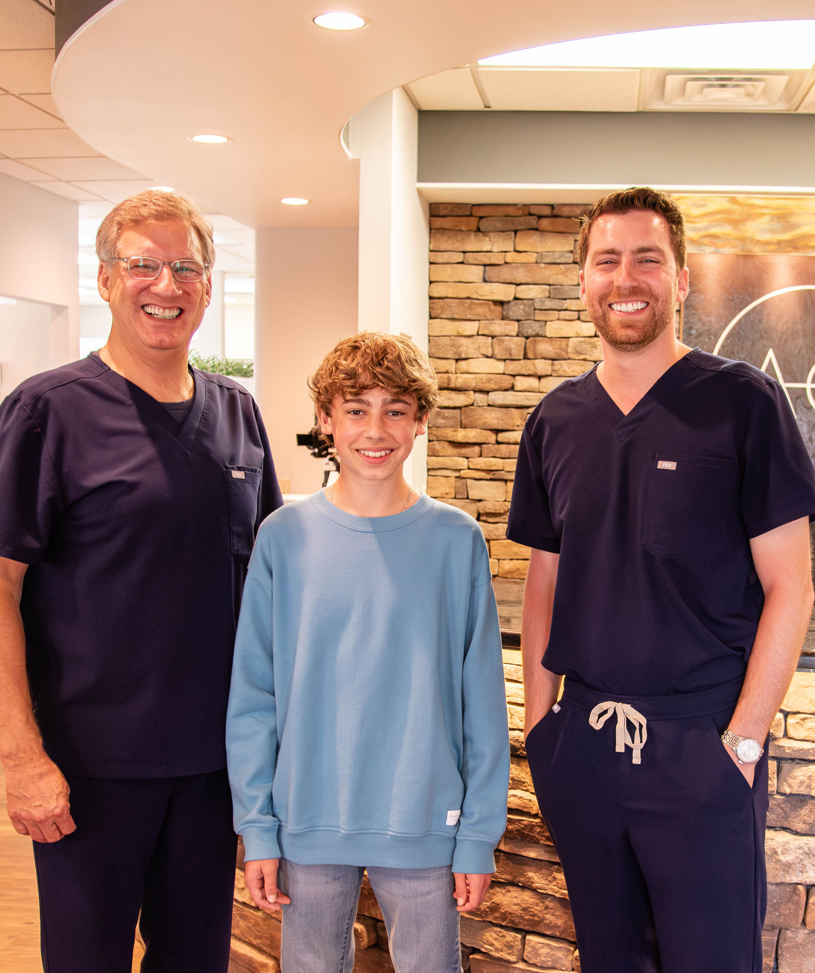 family discussing braces with doctor